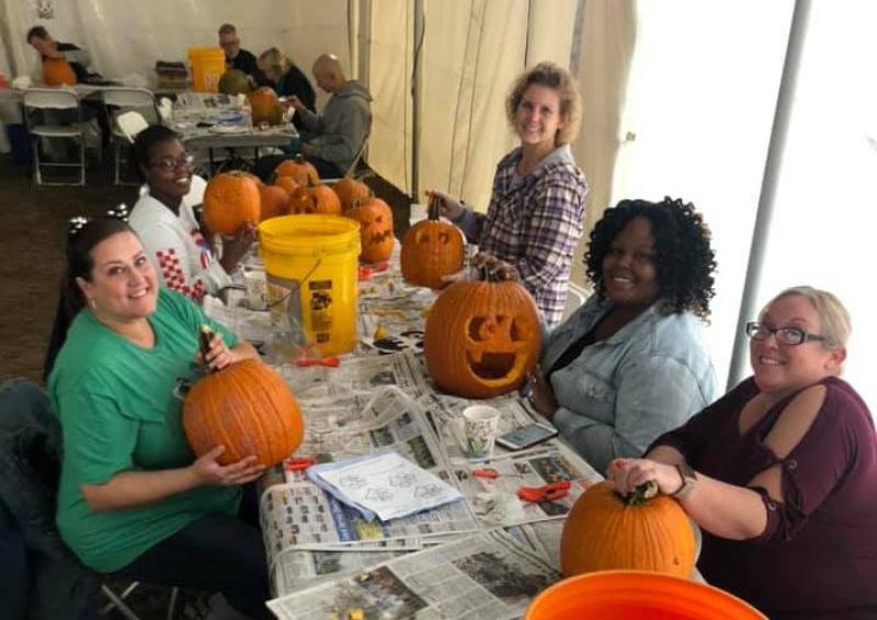 Pumpkin carving at Pumpkin Glow on Stoddard Ave.