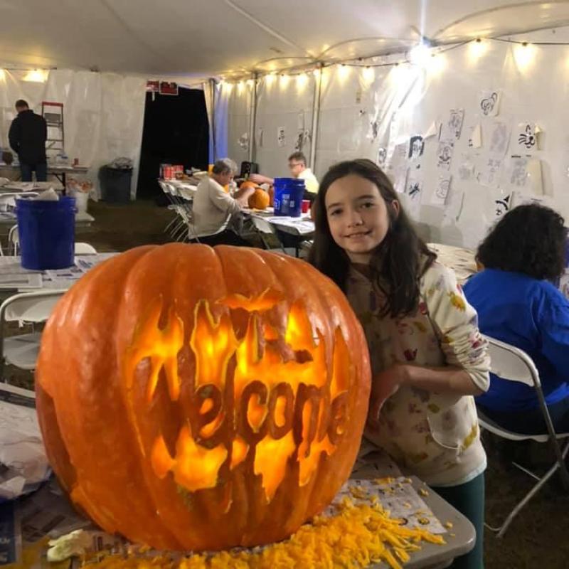 Pumpkin carving at Pumpkin Glow on Stoddard Ave.