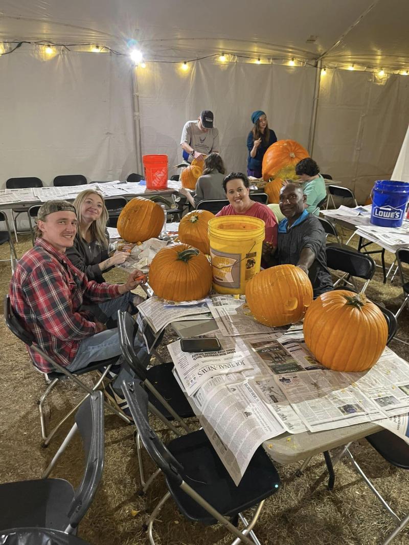 Pumpkins being carved for the Glow on Stoddard Ave.